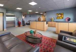 hillsboro aviation facility lobby with front desk and seating area